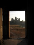 angkor-framed-by-side-temple-door-sunrise