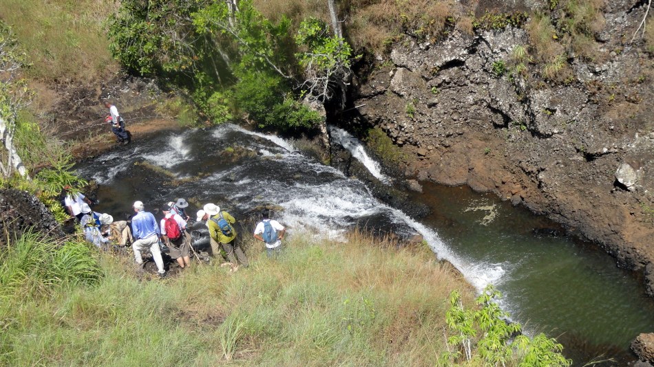 Walkers by the Waterfall